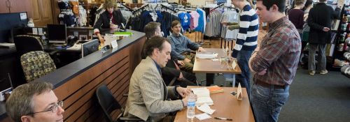 Hillsdale Faculty signing their books for students in the Hillsdale College bookstore.