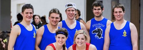 Chi Omega and Sigma Chi volleyball team group photo.
