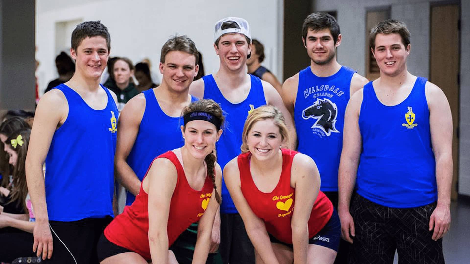 Chi Omega and Sigma Chi volleyball team group photo.