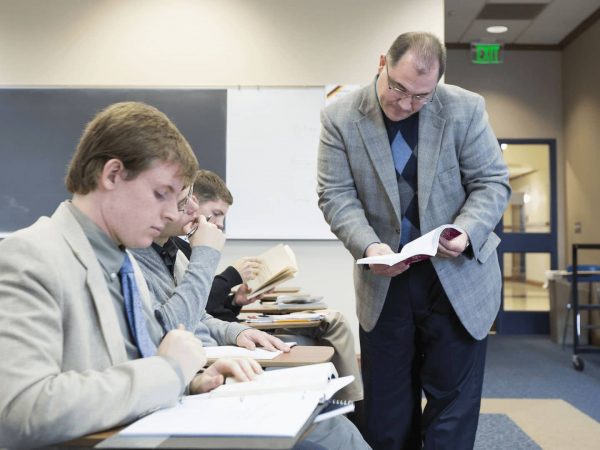 Faculty teaching German in a classroom.
