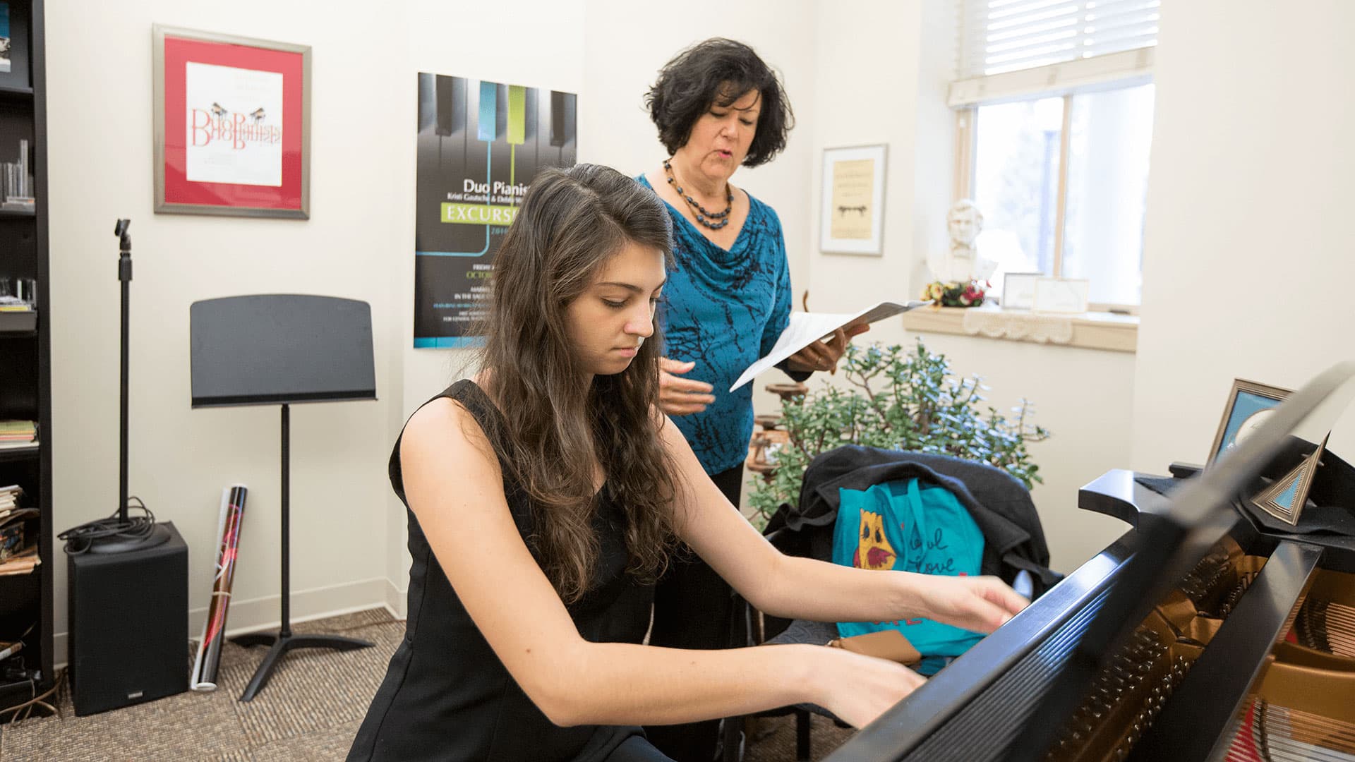 Student playing piano