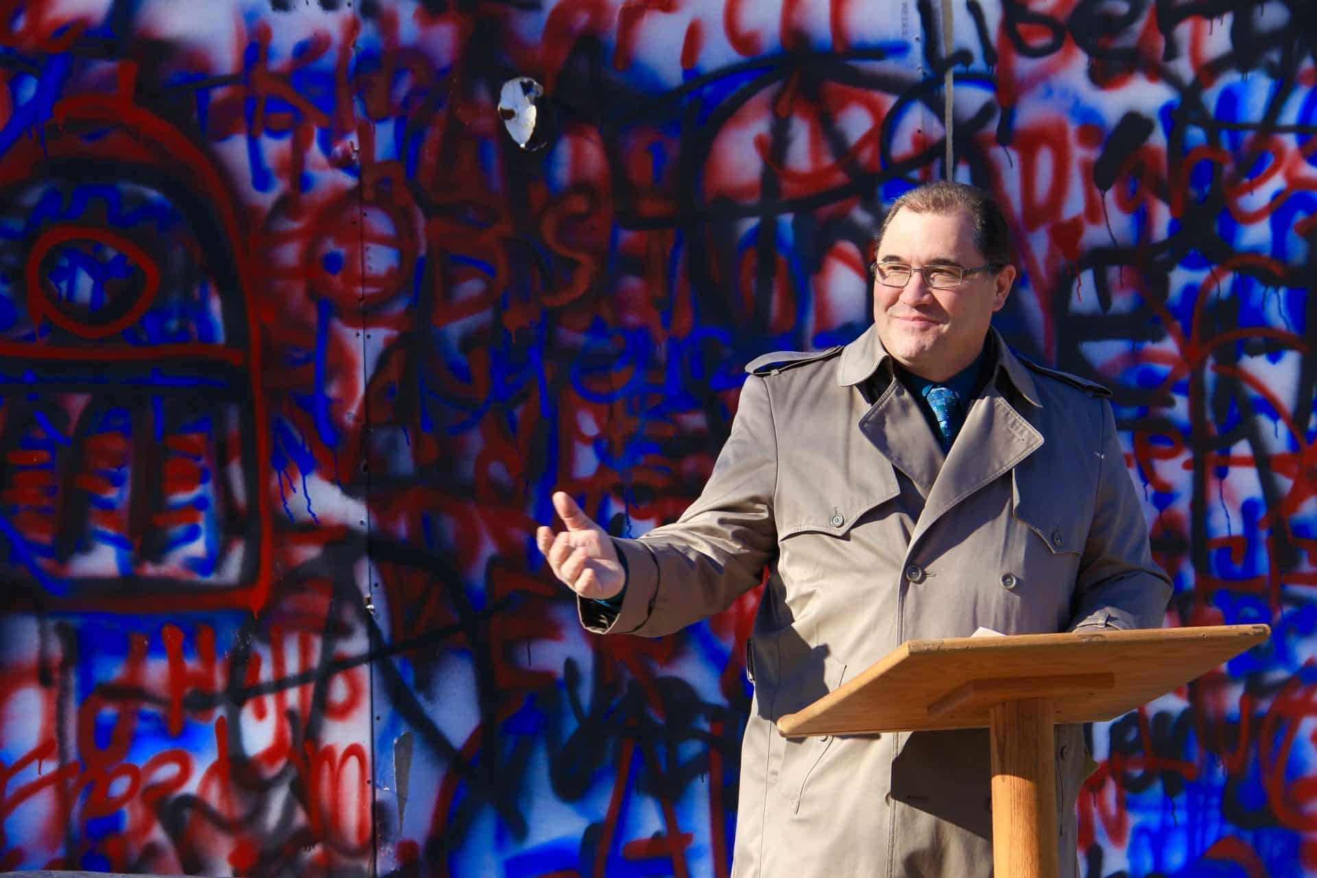 Yaniga at fake Berlin Wall