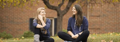 Students sitting on campus