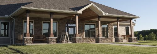 Front exterior of AcuSport Lodge at the John Halter Shooting Sports Center.