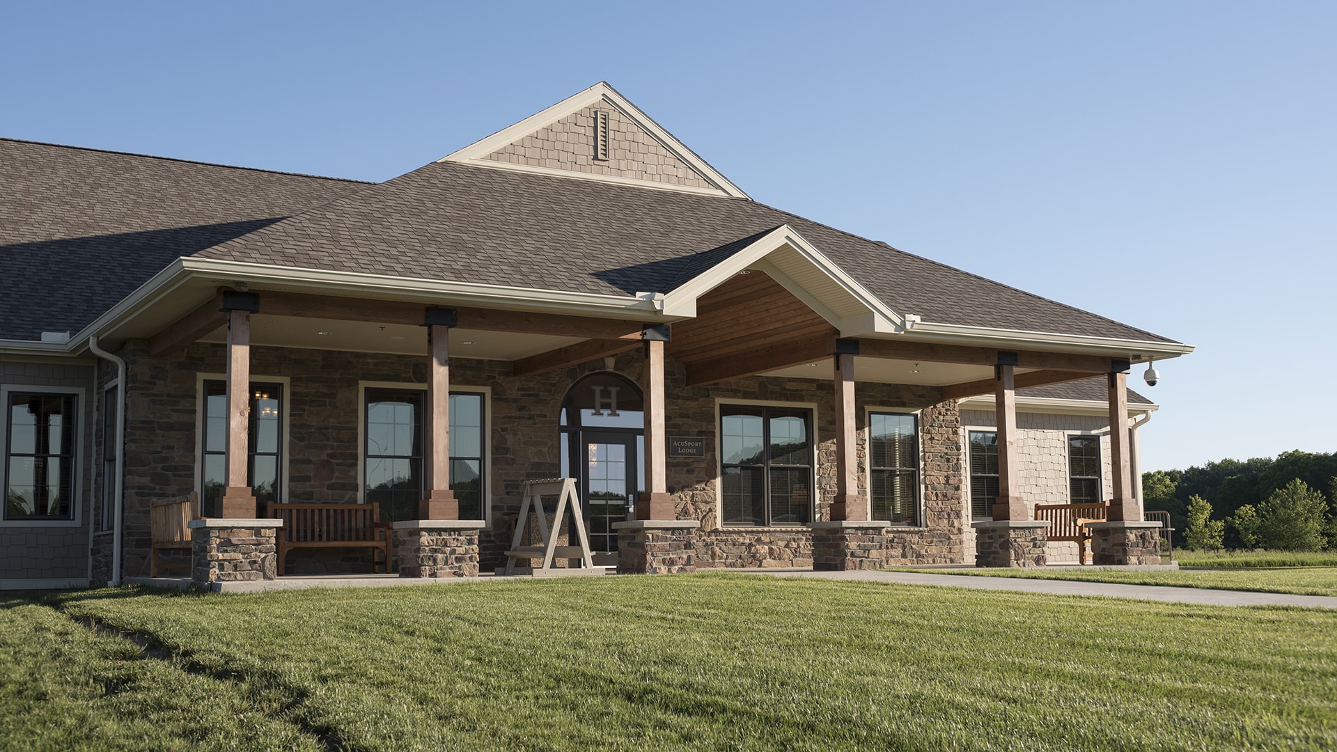 Front exterior of AcuSport Lodge at the John Halter Shooting Sports Center.