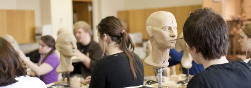 Students working on sculptures
