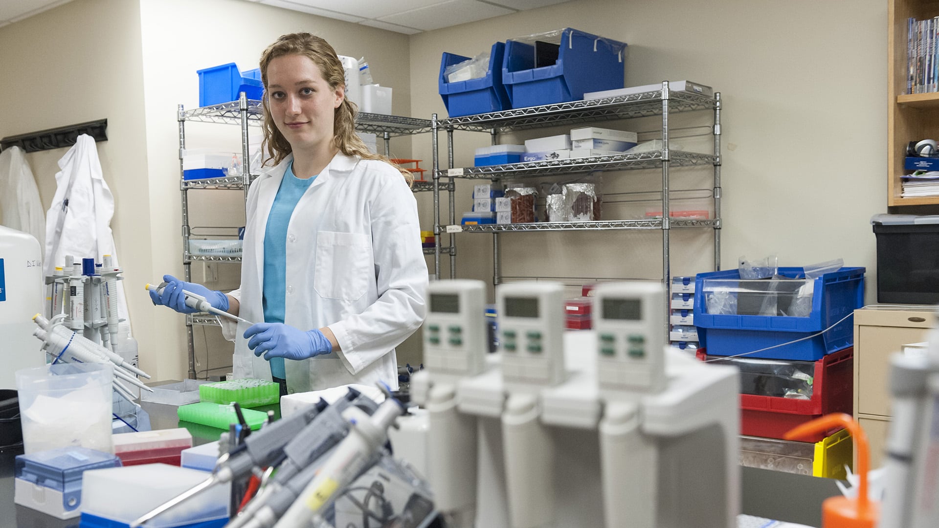 Student conducting research in lab