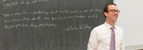 Dr. Barnes during a psychology presentation.