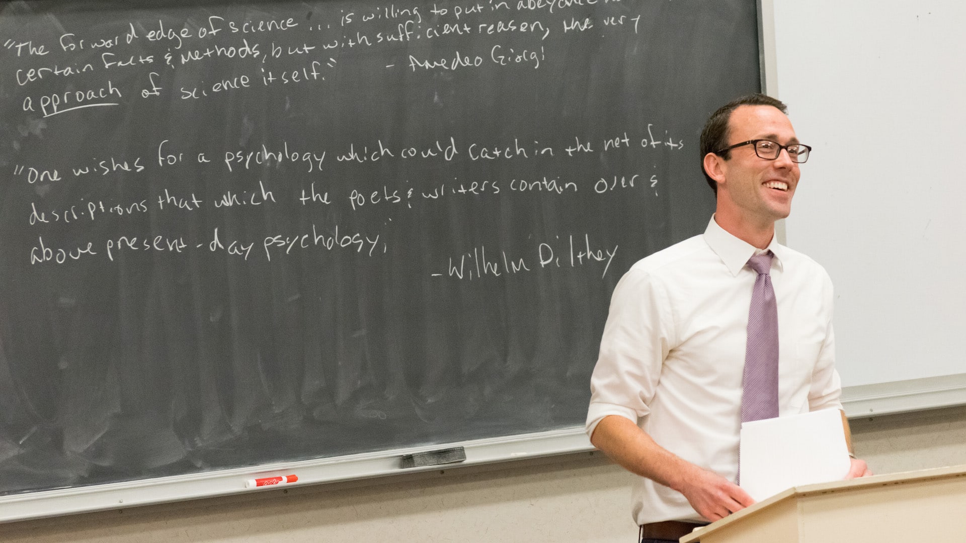 Dr. Barnes during a psychology presentation.
