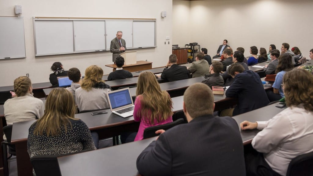 William Voegeli presents a lecture to grad students.