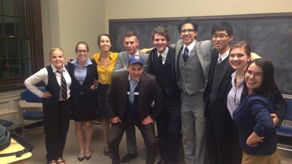 Lambda Pi Eta members group photo.