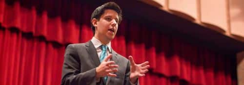 Hillsdale College student speaking at the Edward Everett Oratory competition.