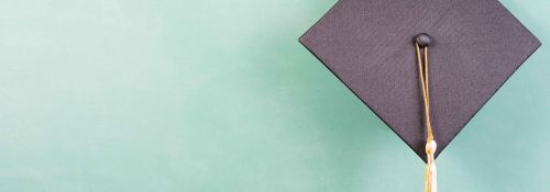 grad cap with green background