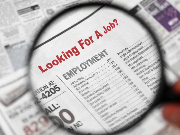 A newspaper clipping with the words, “Looking for a job?”
