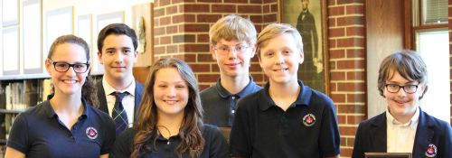 Student group photo of the Academy Everett Oratory Competition participants.