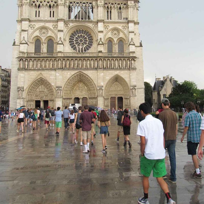 Front exterior of Notre Dame Cathedral in Paris, France.