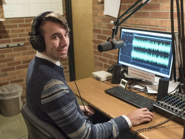 Cole McNeely, '19 at the radio station