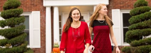 Students walking outside Chi Omega Sorority