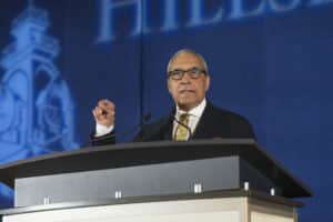 Speaker at podium during a National Leadership Seminar.
