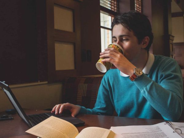 Student Drinking Coffee in AJ's Cafe