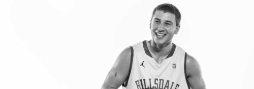 Nate Neveau playing basketball.