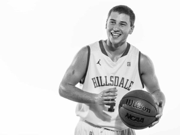 Nate Neveau playing basketball.