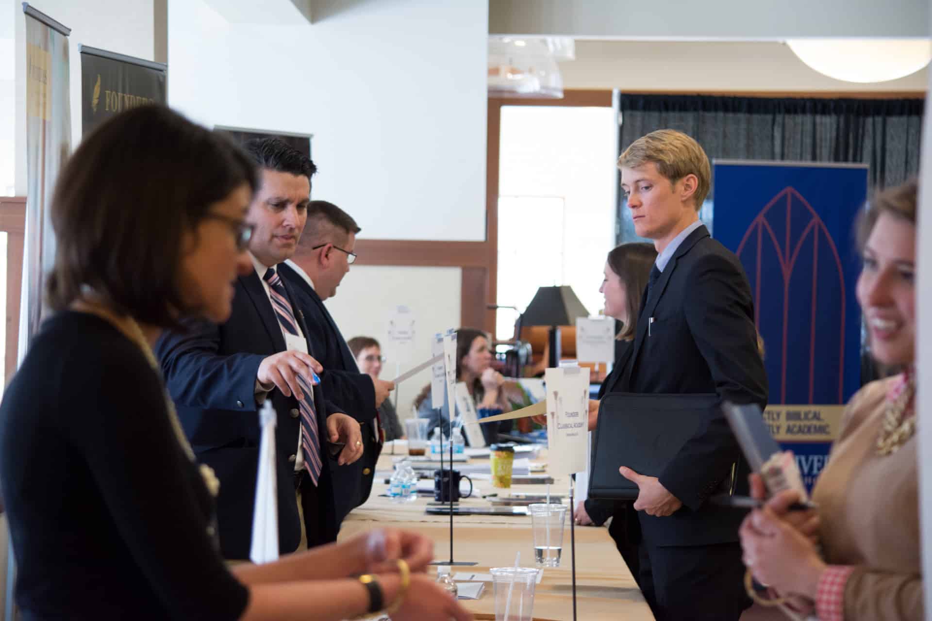 Various booths at the Classical School Career Fair.