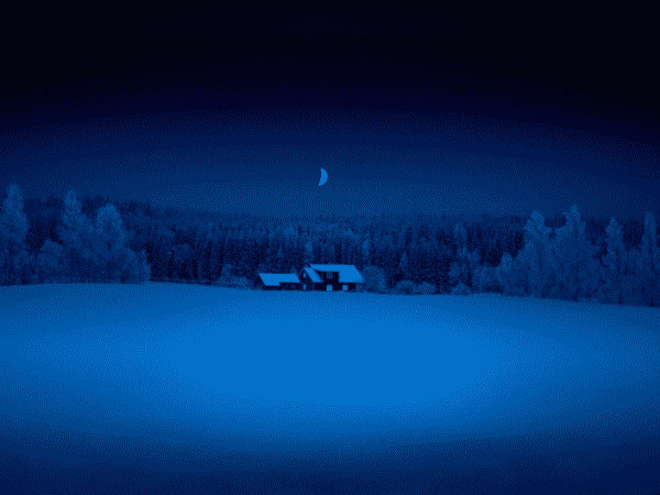 Distant country house surrounded by woods and snow.