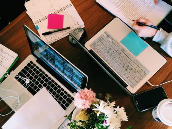 Work station with laptops and coffee