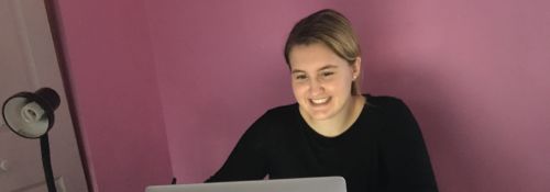 Girl working at laptop