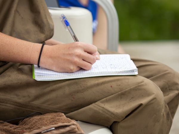 Student taking notes