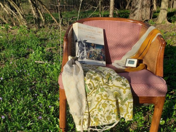 Thrift store purchased chair with other thrift purchased items