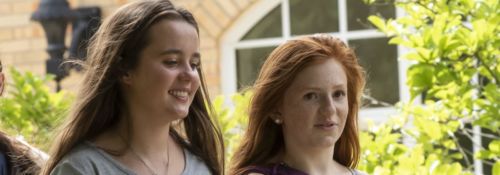 Two female students walking
