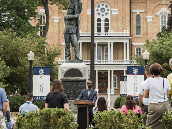A speaker at Blue and White speaking before Central Hall