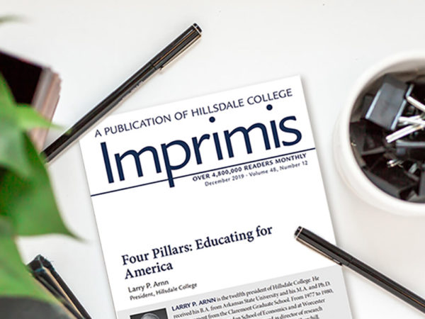 Imprimis issue laying on a desk.