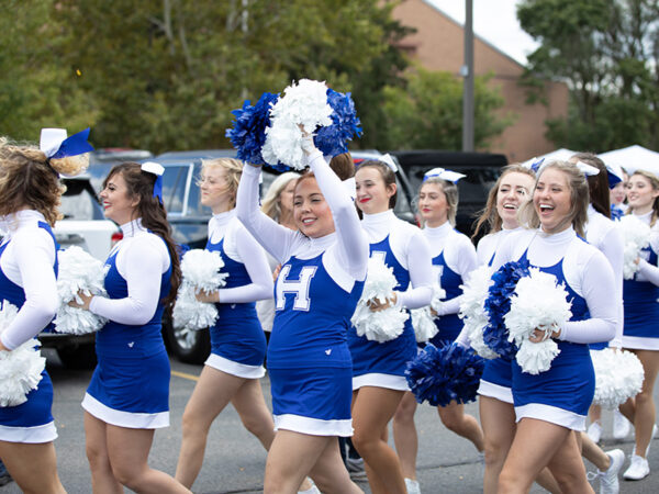 Cheerleaders at cheering at homecoming
