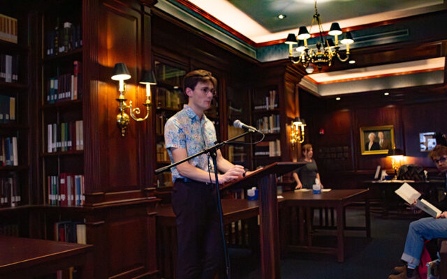 Man standing at microphone
